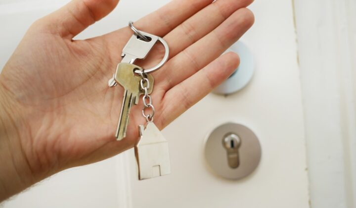 Apartment keys and lease paperwork representing Wolse and Jeonse rental contracts